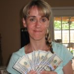 Woman wins $1000 from the iWIN Text Group
