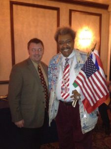 Tom Cavalli posing for picture with Don King.