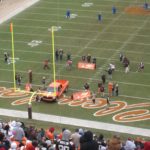 Overhead shot of Tom winning the Browns truck on the field