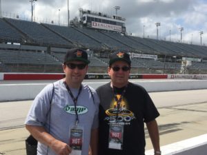 Tom Cavalli and friend on the Darlington NASCAR track