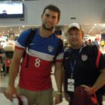 Tom Cavalli posing for picture with Andrew Luck at the airport